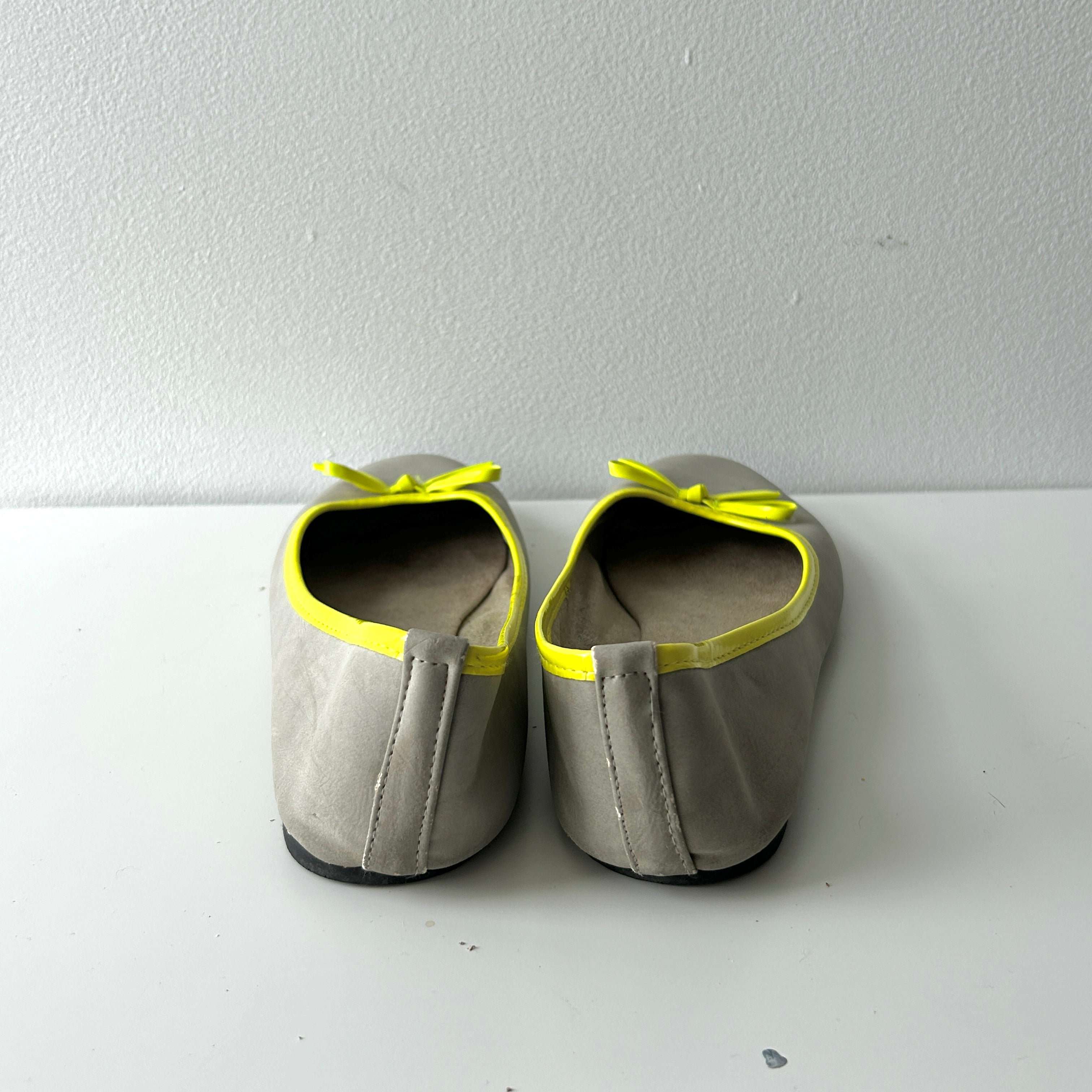 2000s grey and neon yellow ballet flats