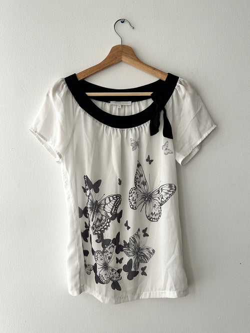Twee blouse with butterfly print and bow by Armand Thierry