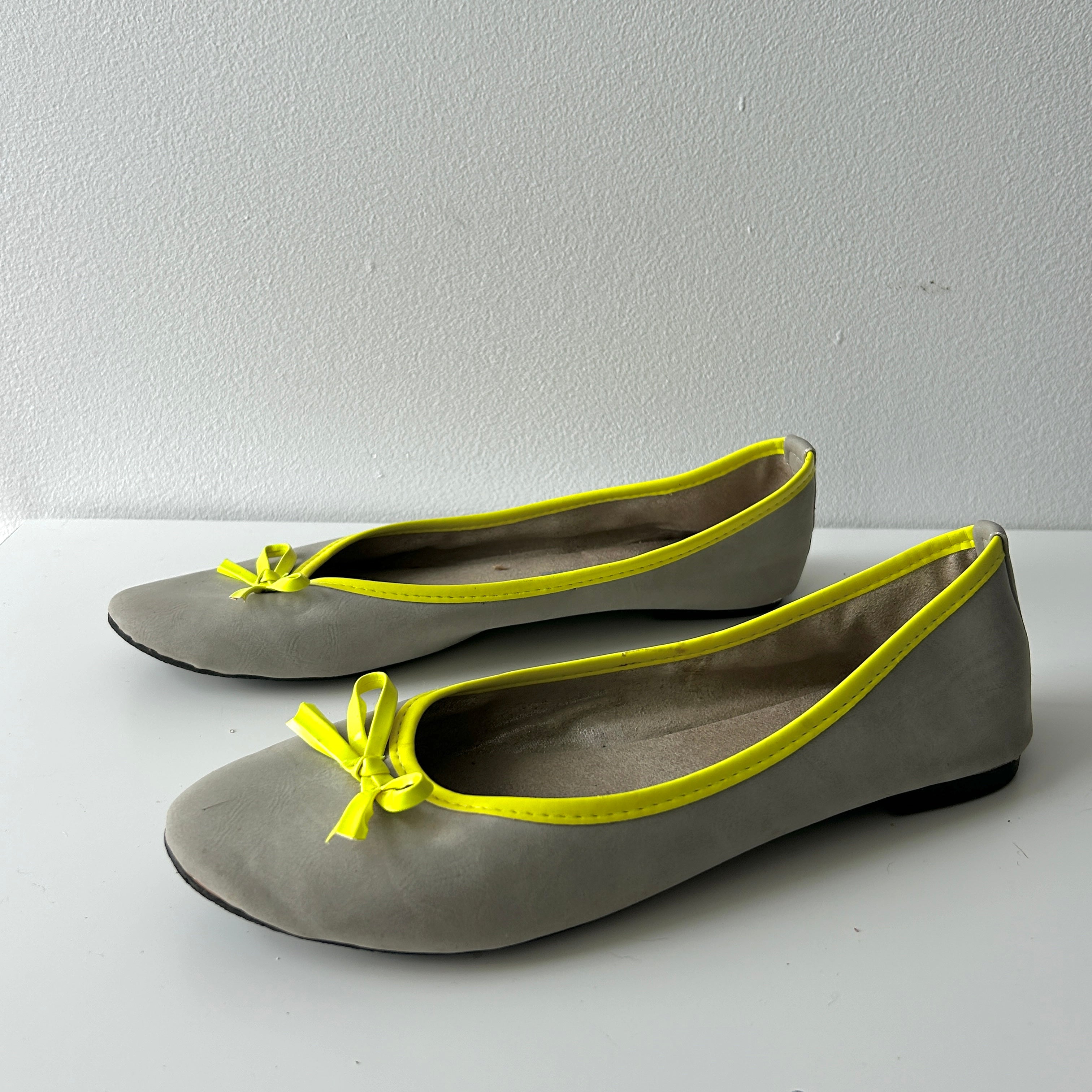 2000s grey and neon yellow ballet flats