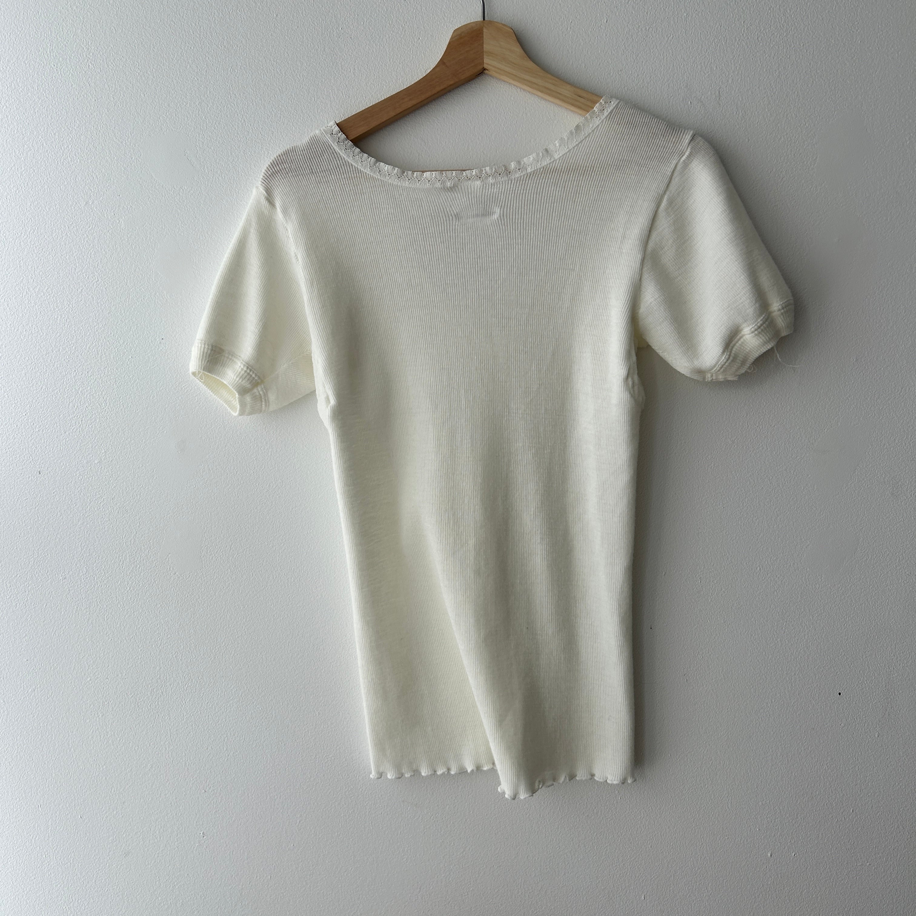 Coquette white knit top by Rosina Marzuola