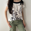 Twee blouse with butterfly print and bow by Armand Thierry