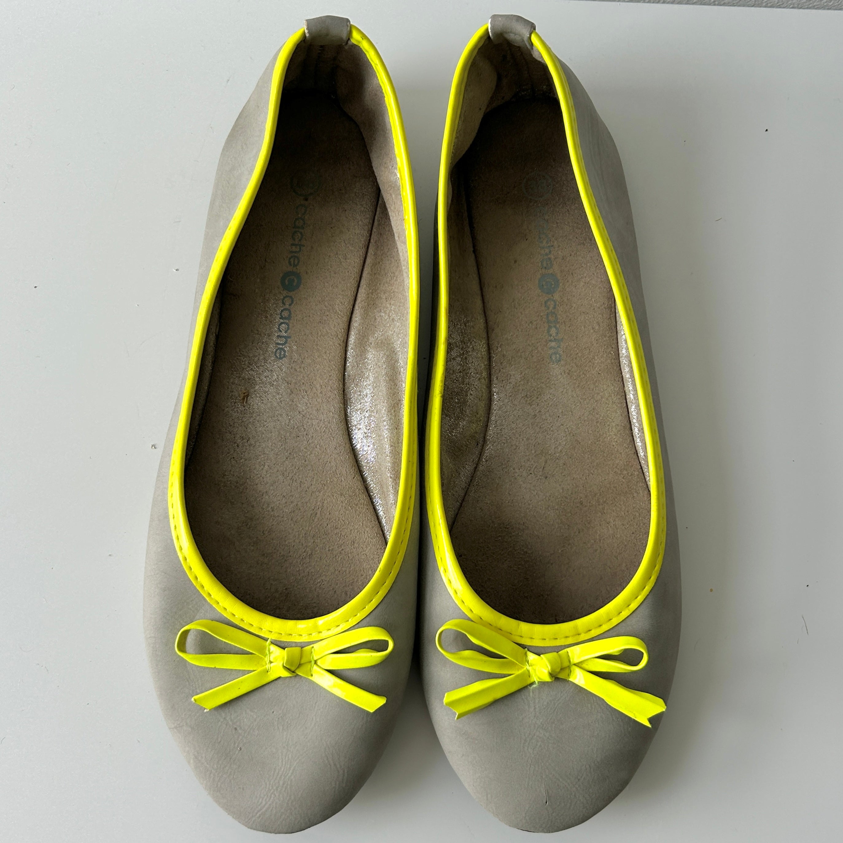 2000s grey and neon yellow ballet flats