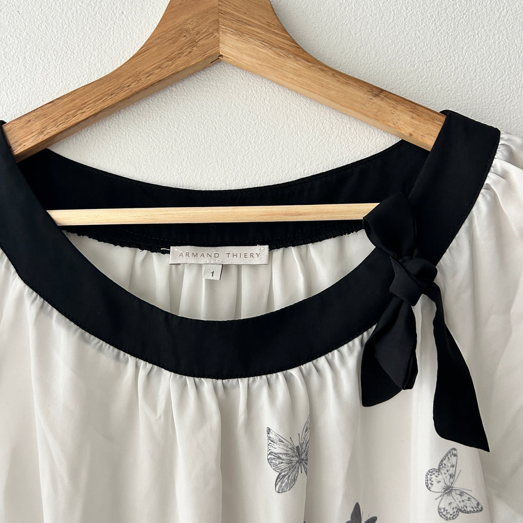 Twee blouse with butterfly print and bow by Armand Thierry
